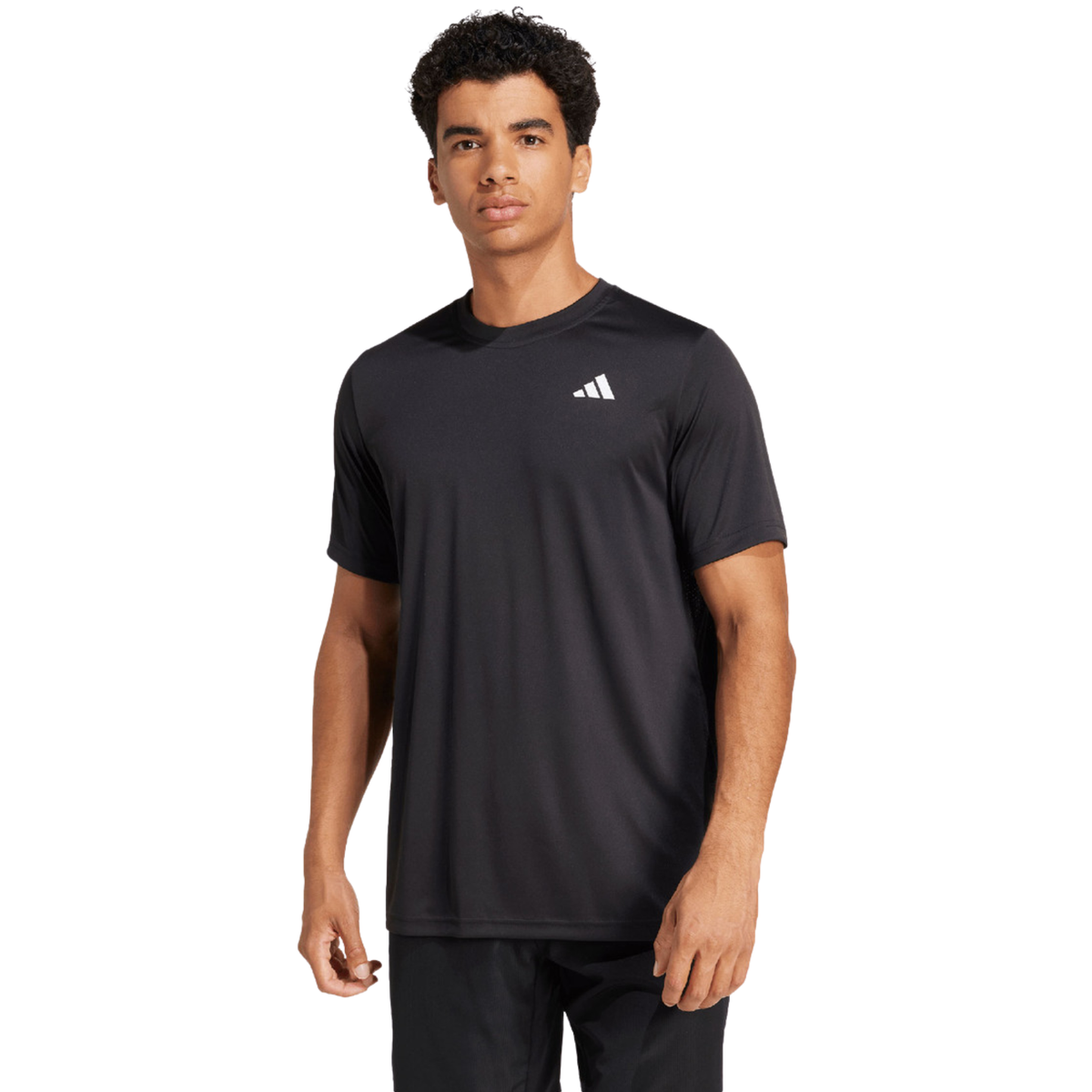 Front view of a model wearing the black adidas T-shirt.