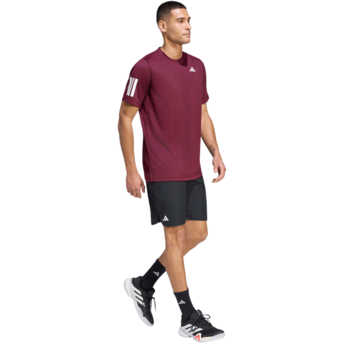 Full-body view of a model wearing the burgundy adidas T-shirt.