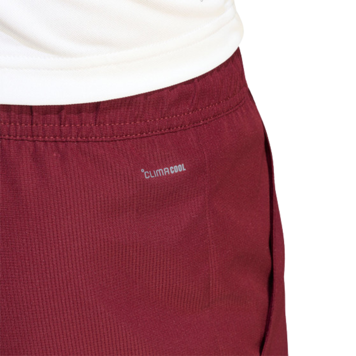 Close-up of the CLIMACOOL detail and fabric of the burgundy adidas Club Short KS8299.