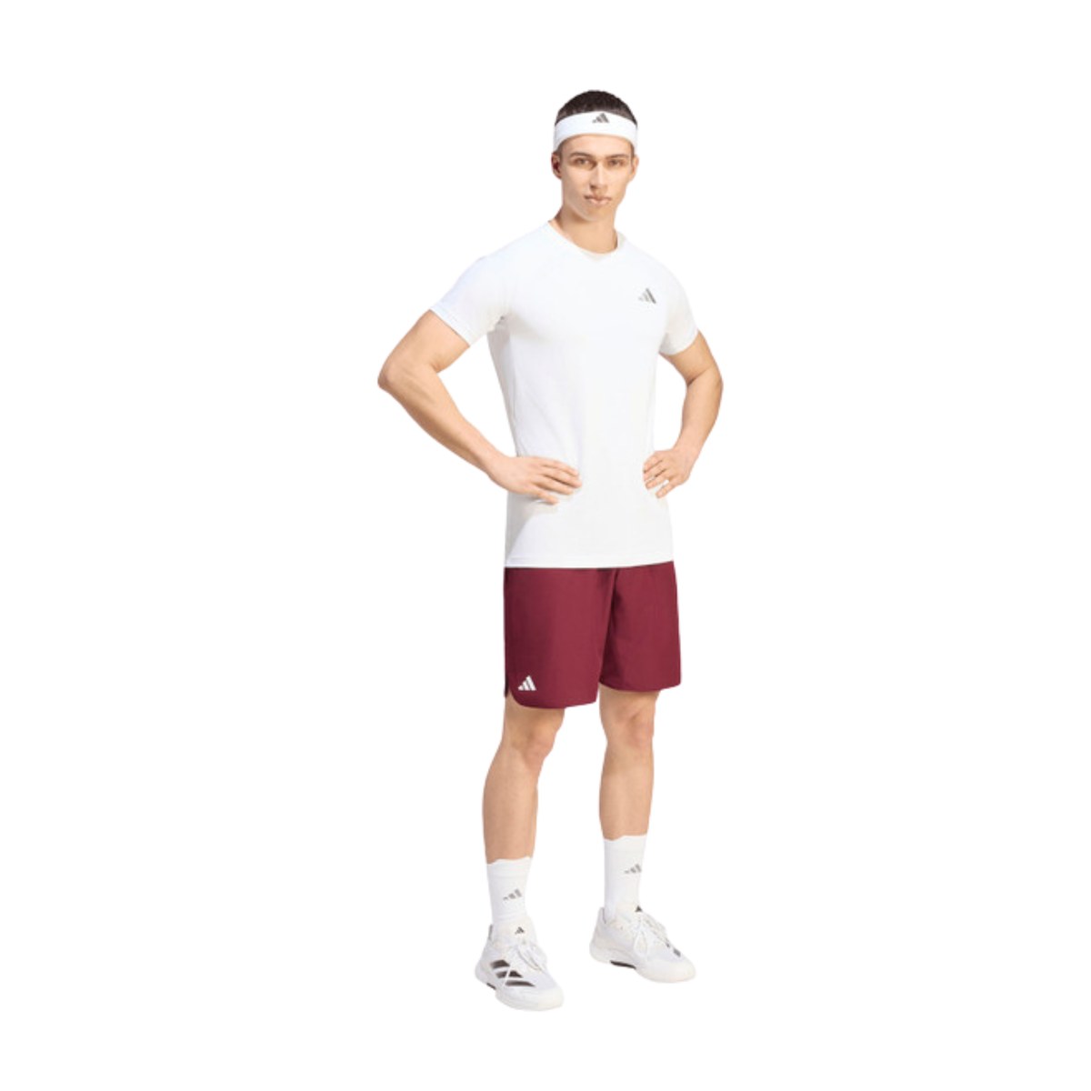 Full outfit view of a model wearing the burgundy adidas Club Short KS8299.