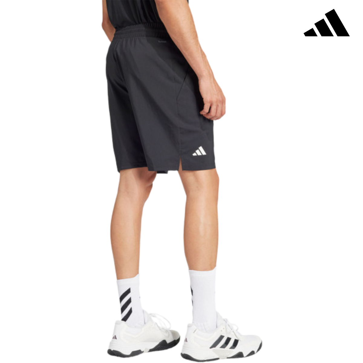 Back view of a model wearing the black adidas men's shorts with adidas logo.