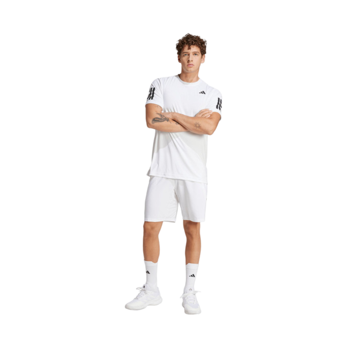 Full outfit view of a model wearing the white adidas men's shorts.