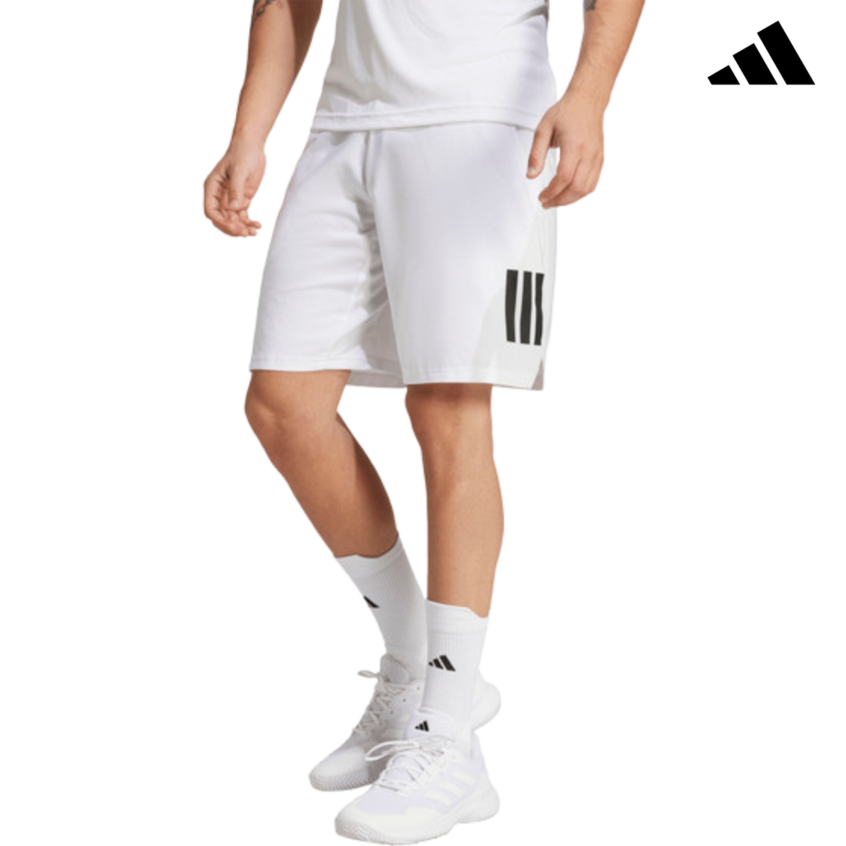 Front view of a model wearing the white adidas men's shorts with adidas logo.