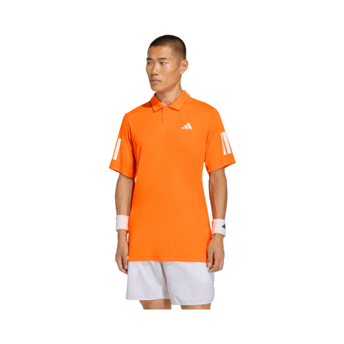 Front view of a model wearing the orange adidas polo shirt.