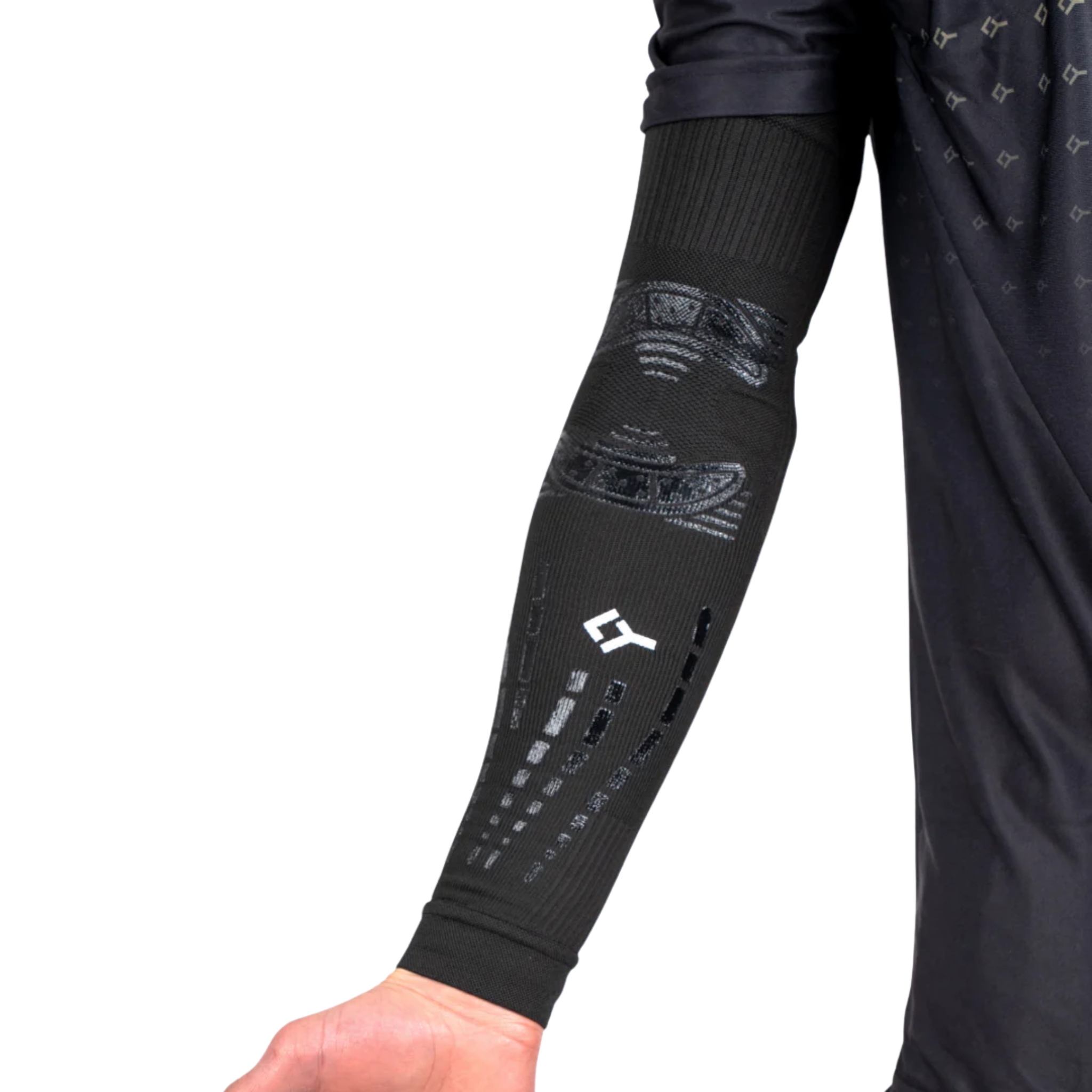 Back view of an athlete wearing Floky Elbow Sleeves Black (2 Pieces), showcasing the secure fit and compression technology for elbow protection and recovery.
