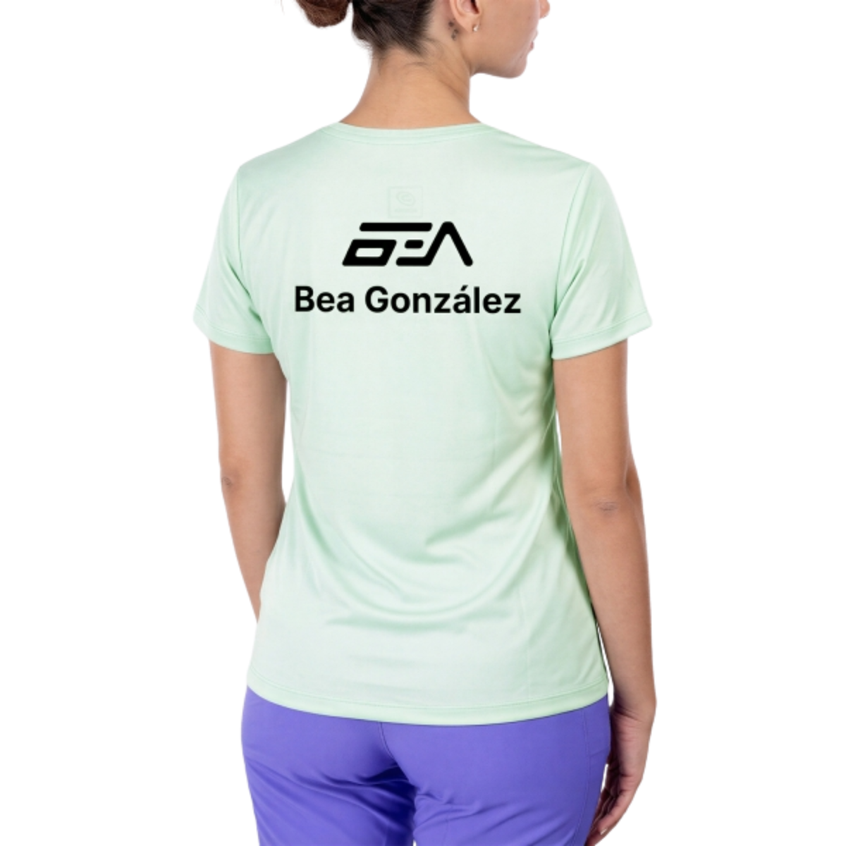 A back view of the Bullpadel Barrado BG Jade women's padel T-shirt, showing the jade fabric and Bea González signature detail.