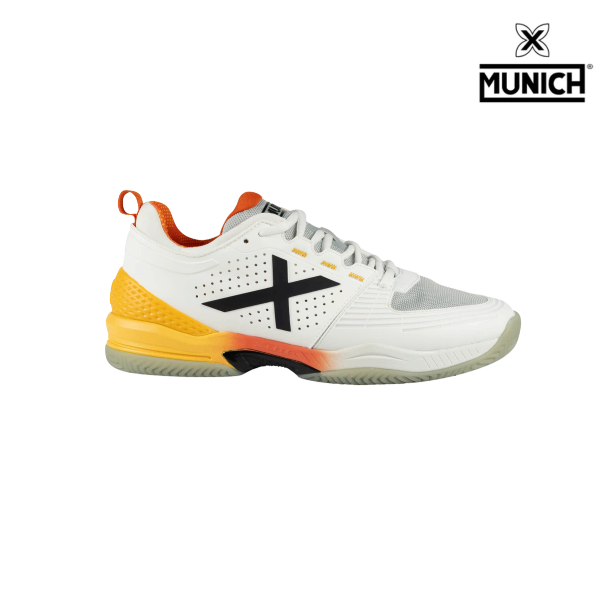 Munich Atomik 55 white padel shoe shown from the side, featuring white laces, a large black X logo, perforated side panels, a light grey mesh toe area, a bright yellow heel section, orange inner lining and pull tab, a soft orange fade at the midsole and a translucent pale outsole, with the Munich logo in the top right corner.