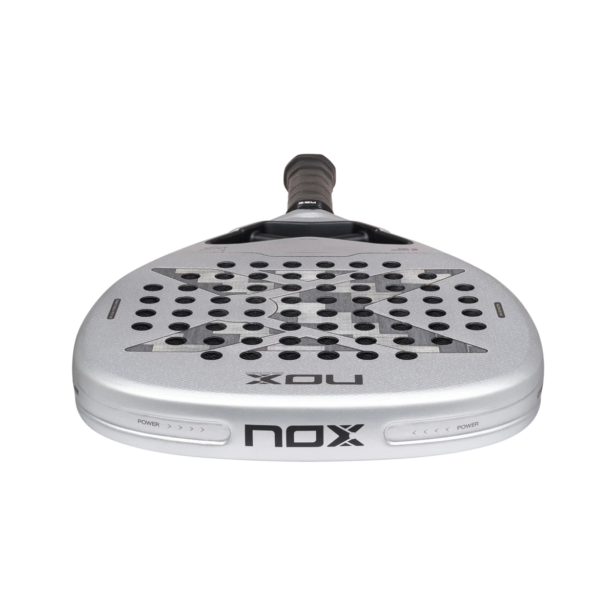 Low-angle view of the NOX Genius Attack 12K Alum Xtrem 2027 showing the edge of the racket, perforated face and aerodynamic frame construction.