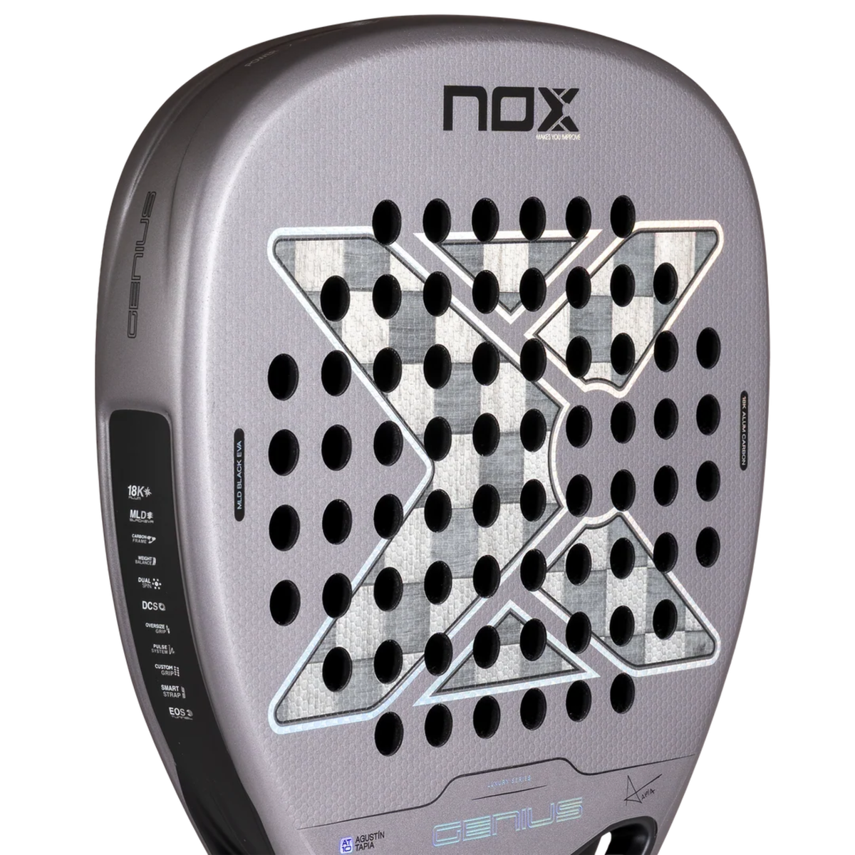 Angled close-up of the Nox AT10 GENIUS ATTACK 18K ALUM 2027 padel racket, showing the silver X design, black holes and frame details.