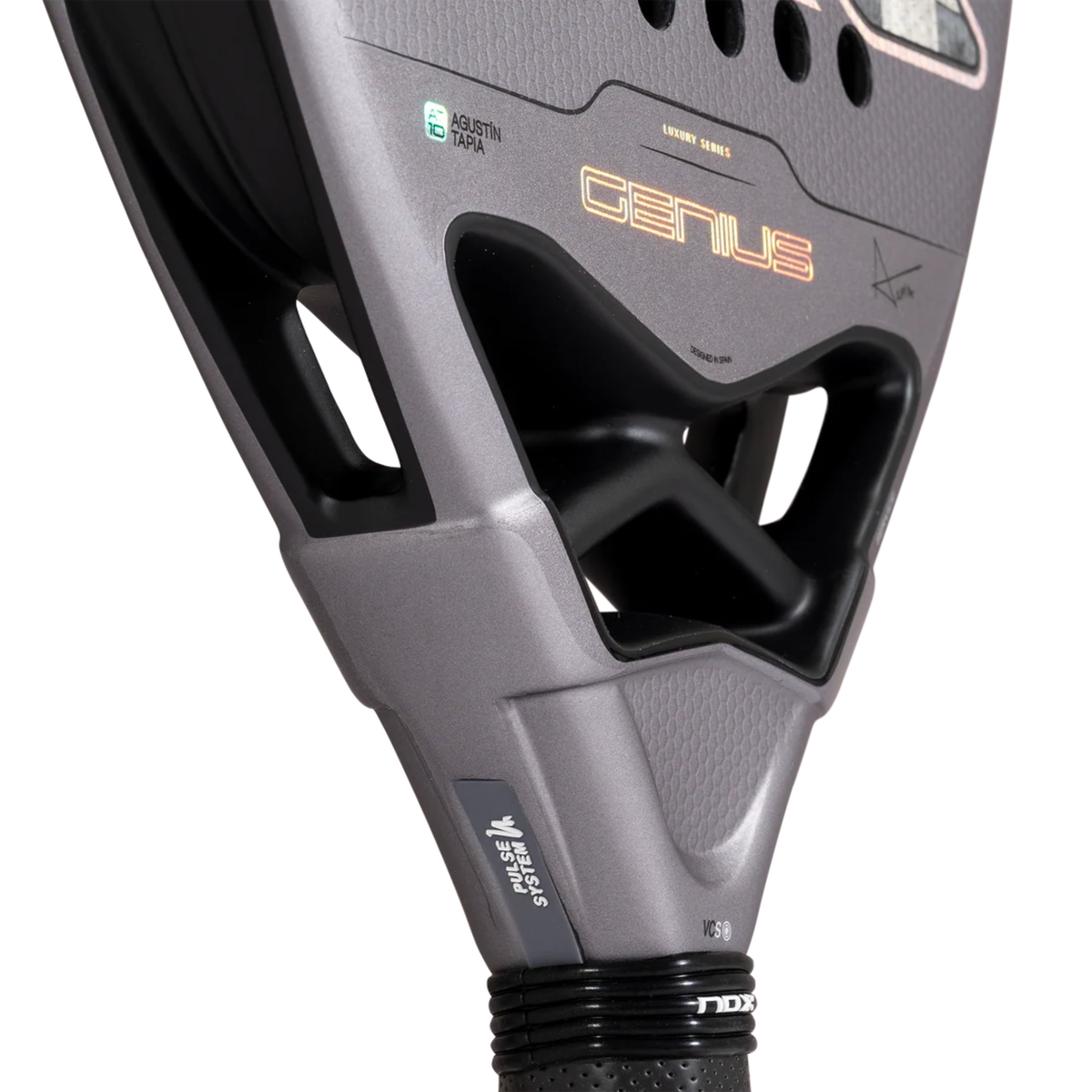 Close-up of the Nox AT10 GENIUS ATTACK 18K ALUM 2027 throat area, showing the black bridge, Pulse System detail and metallic grey frame.
