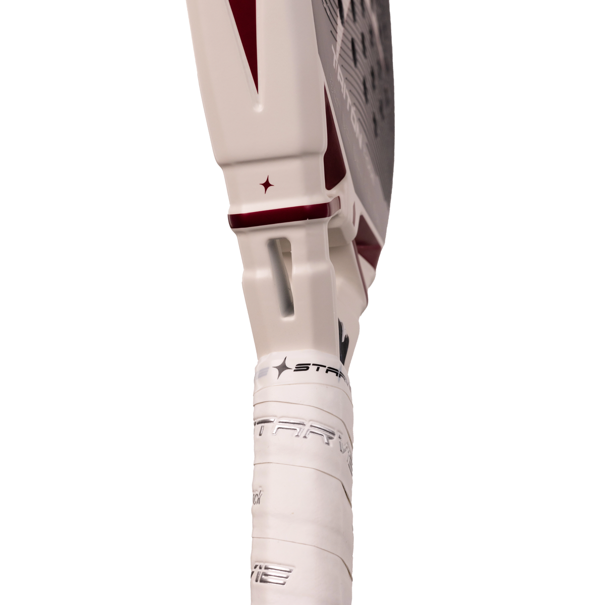 A close-up of the bridge area of the StarVie Tritón T-One padel racket, showing the distinctive open bridge and lower racket face.