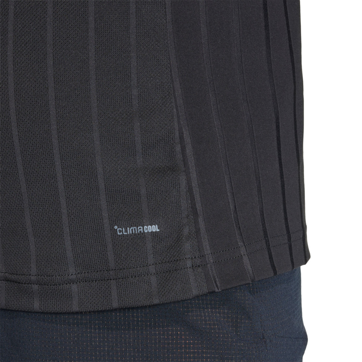 Close-up detail of the adidas Climacool Freelift Pro T-Shirt Black KG6053 showing the vertical stripe texture, breathable fabric and Climacool logo near the hem.