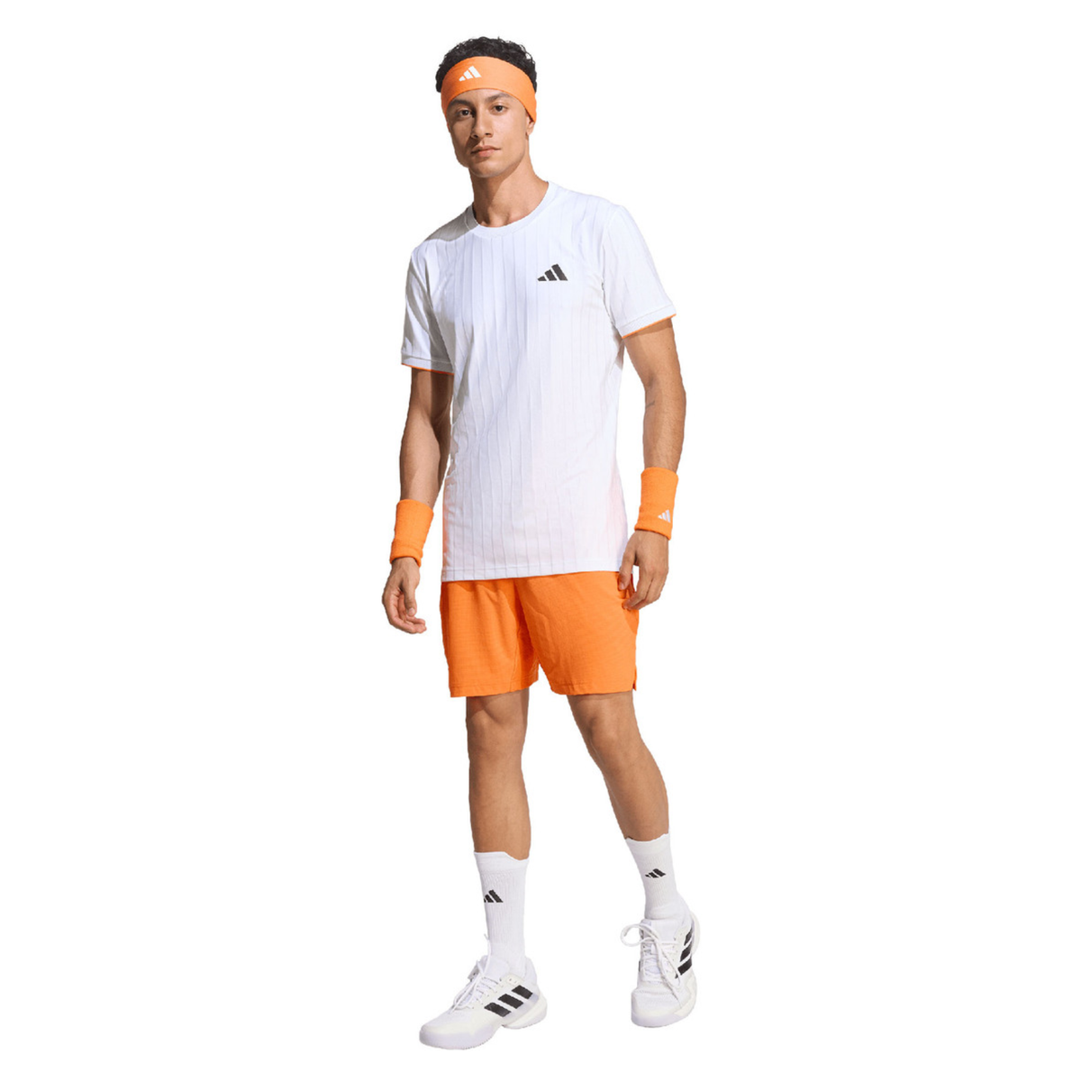 Three-quarter front view of a male model wearing the adidas Climacool Freelift Pro T-Shirt White, highlighting the athletic fit, white fabric and black chest logo.
