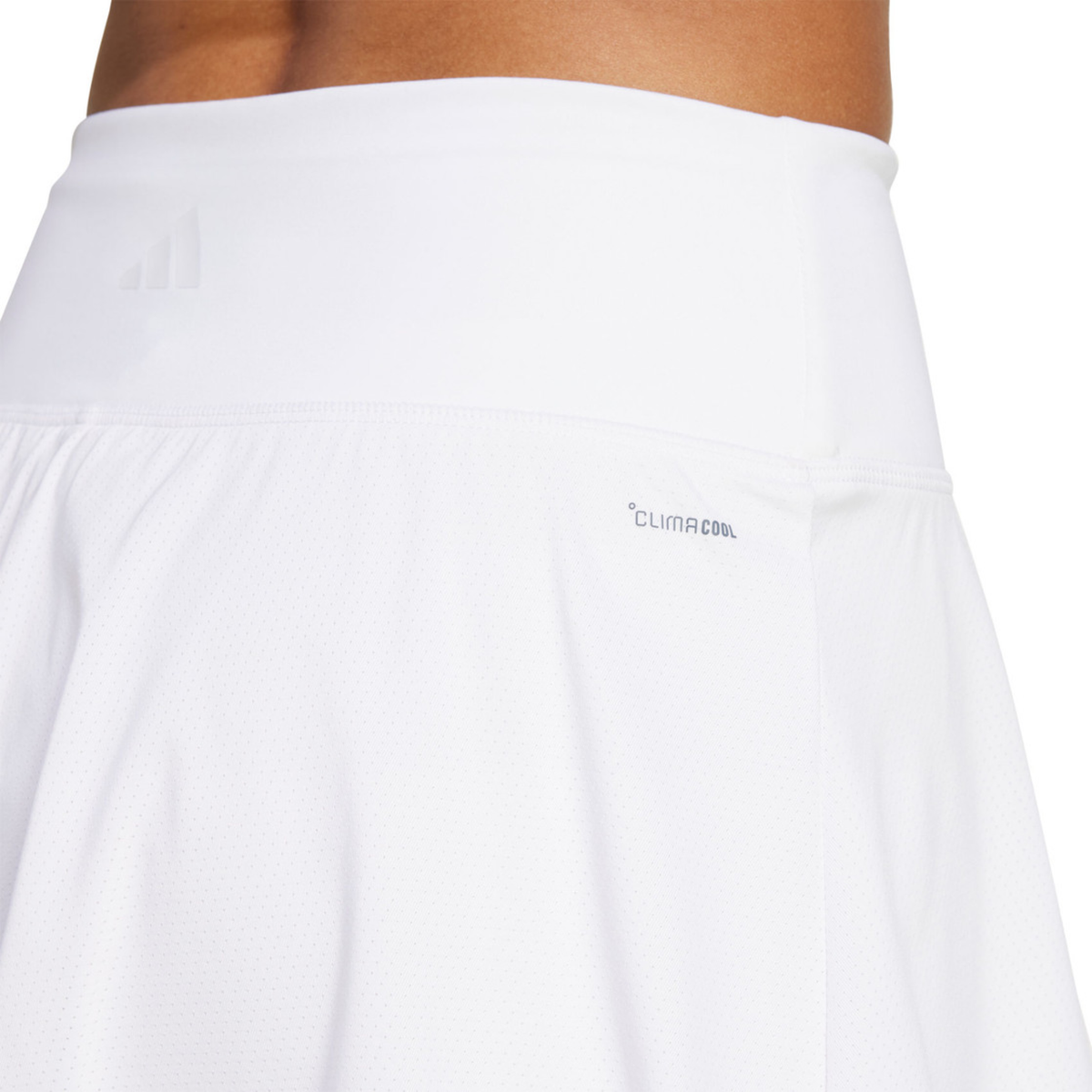 Close-up detail view of the adidas Club Climacool Skirt White, highlighting the wide waistband and smooth white fabric construction.