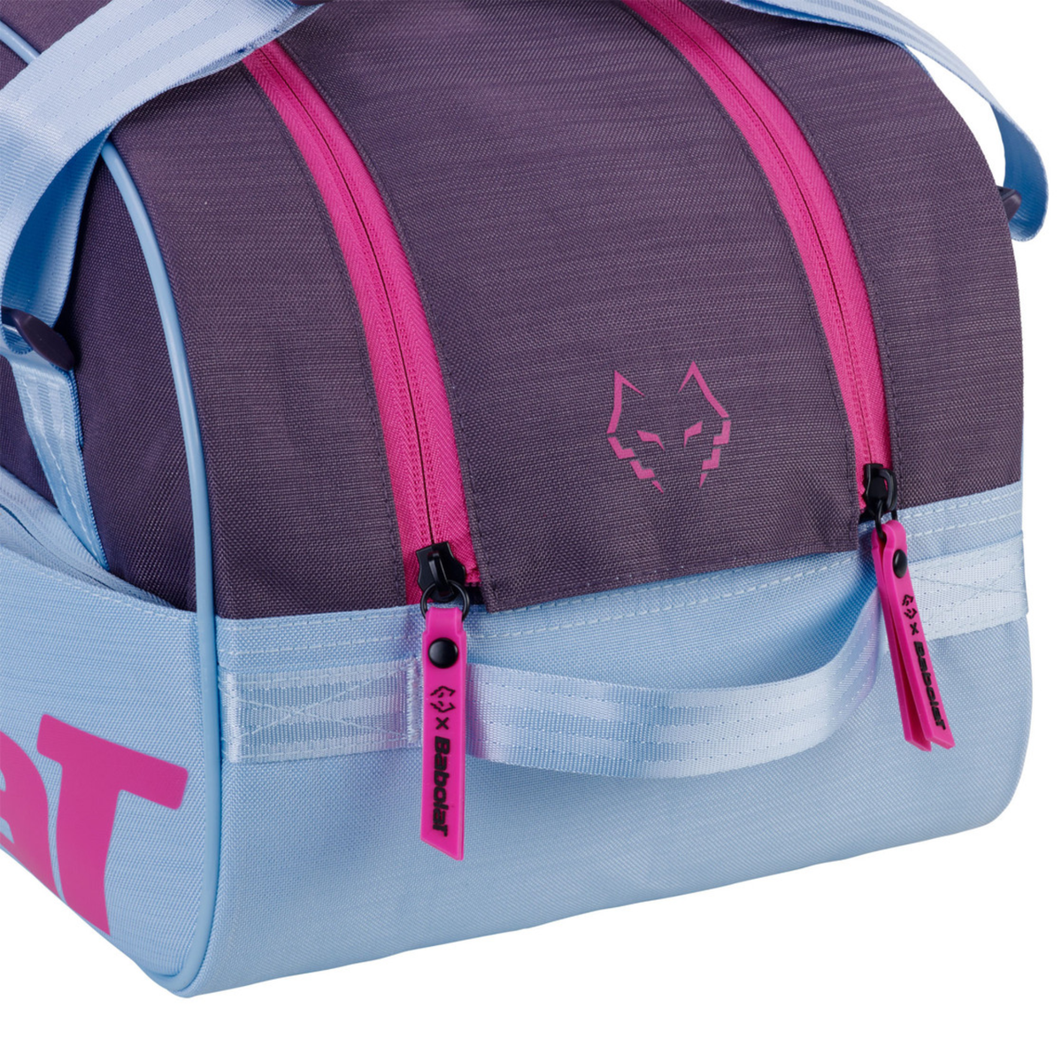 Close-up detail of the Babolat Court S Juan Lebrón Padel Bag 2027, showing the front compartment, bright pink zipper pulls and Juan Lebrón wolf logo on the bag.
