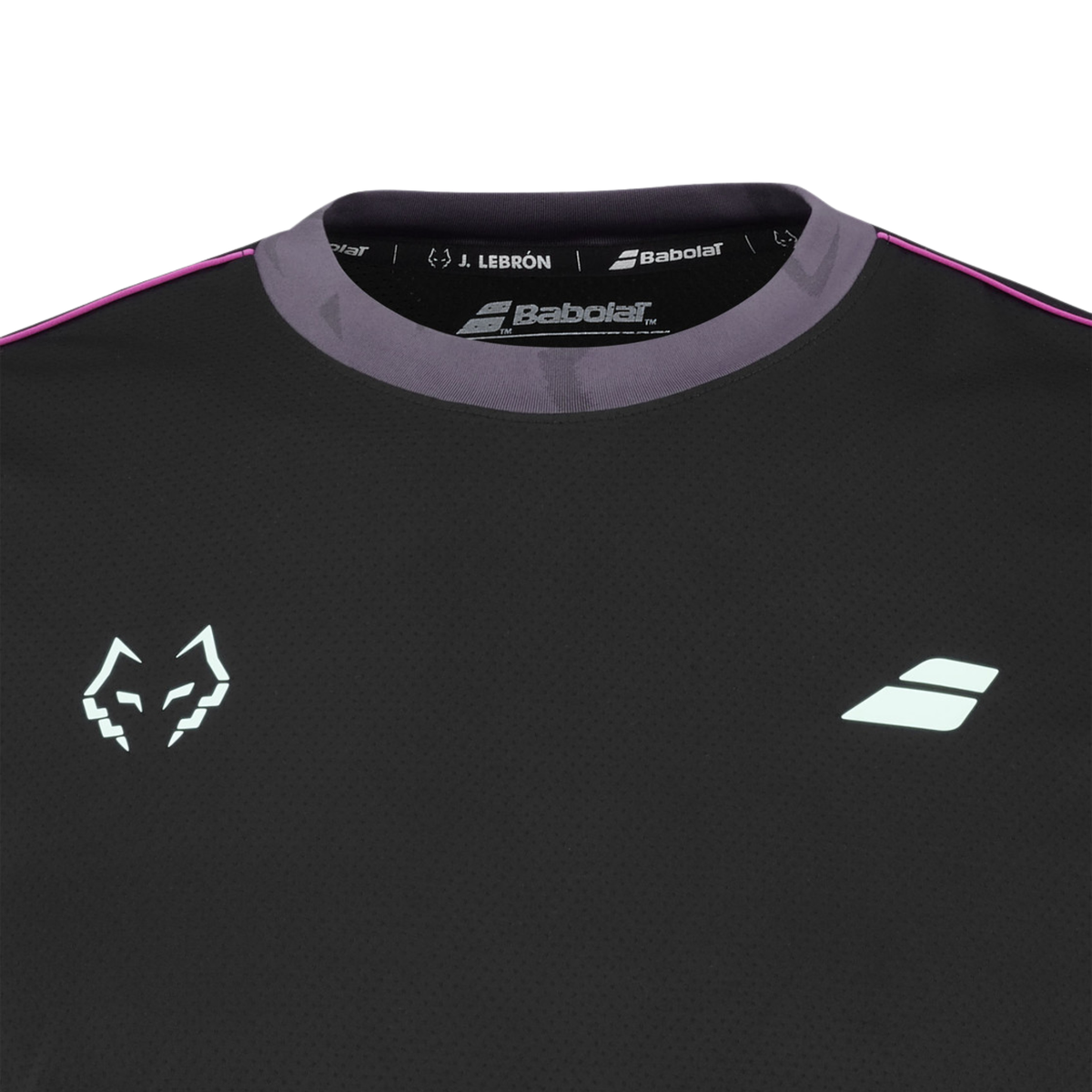 Close-up of the upper front of the Babolat Crew Neck Tee Lebron Men Black 2027, showing the purple crew neck collar, textured black fabric and light blue Babolat and Juan Lebron chest logos.