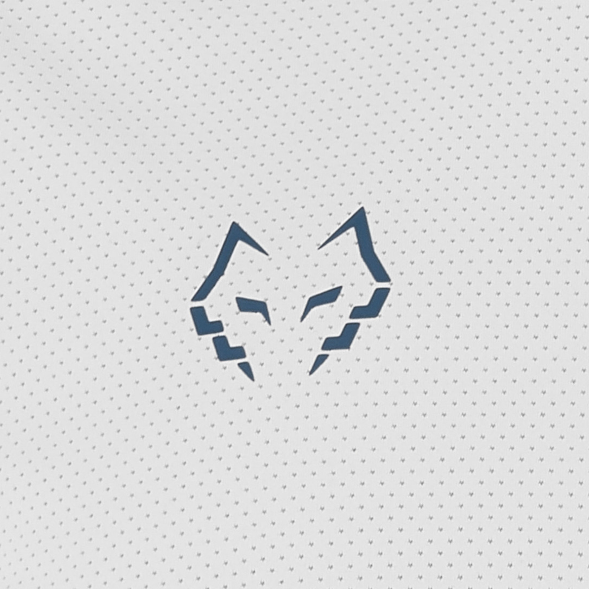 Detailed close-up of the Babolat Crew Neck Tee Lebron Men White 2027 fabric, showing the breathable textured white material and dark blue Juan Lebron wolf logo.