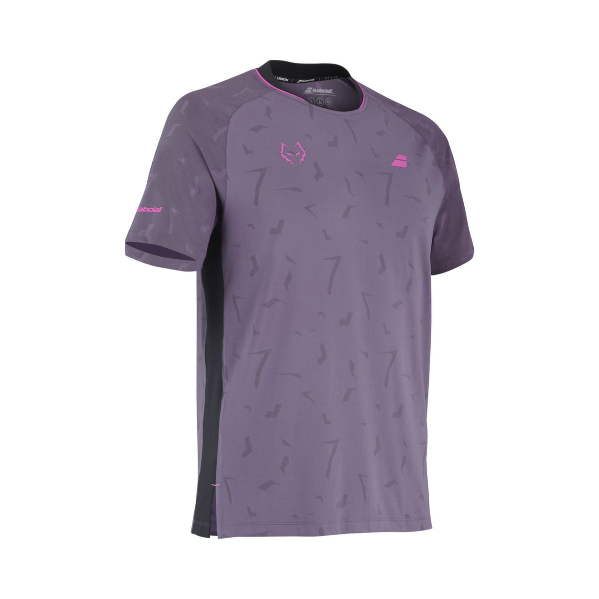 Angled front view of the Babolat Juan Lebrón Replica Tee, showing the purple fabric, tonal all-over pattern, pink chest logos and black side panel details.