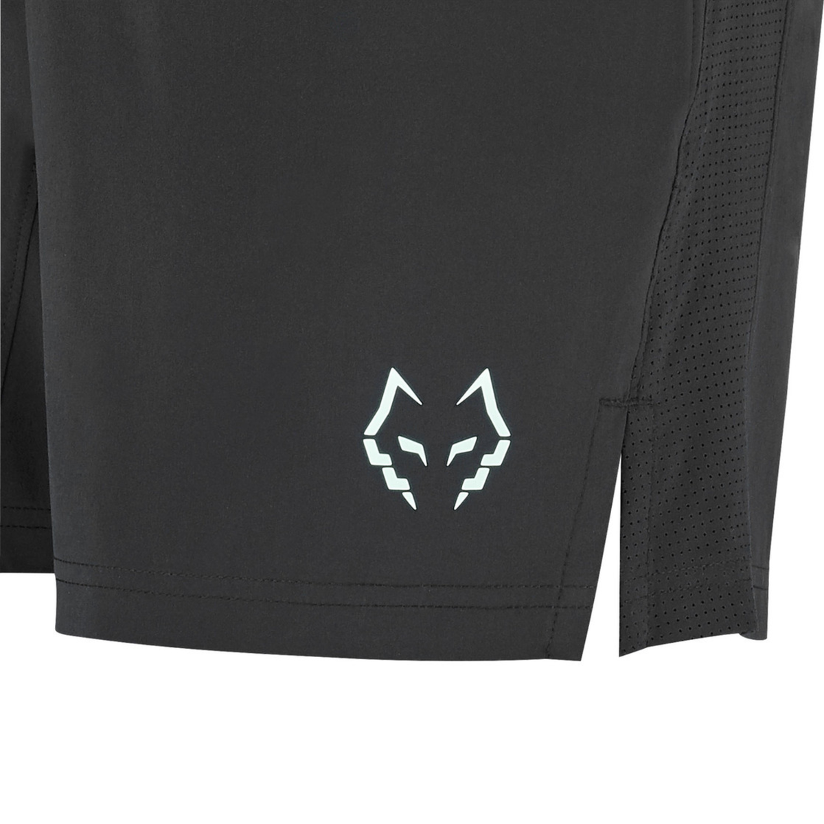 Close-up of the lower leg area of the Babolat Juan Lebrón Short Black 2027, showing the black fabric, side slit and light blue Juan Lebrón wolf logo.