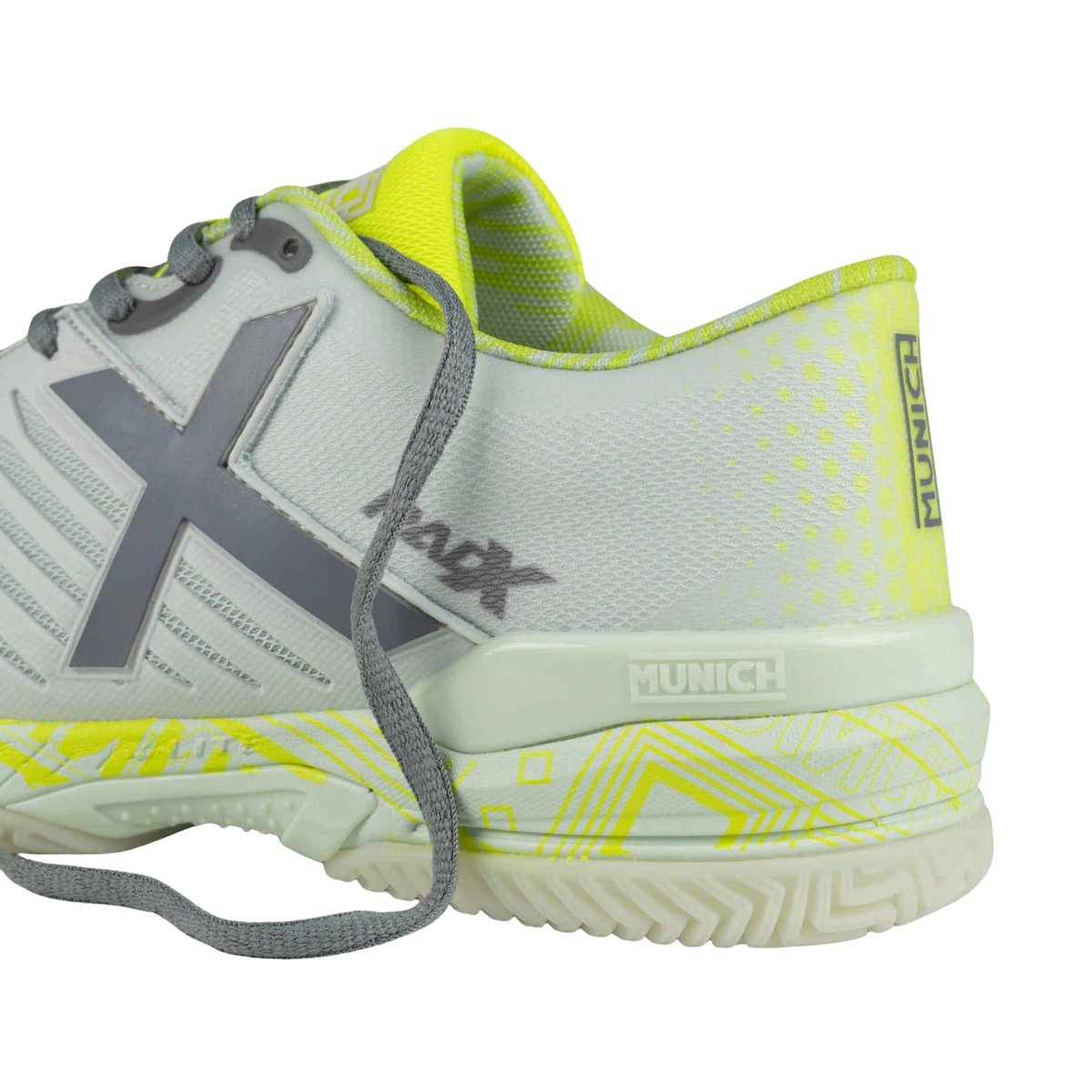 Close-up of the heel and rear side of the Munich Padx 68, showing the light grey upper, grey laces, fluor yellow inner lining, dotted heel detail, Munich heel branding and patterned fluor yellow midsole.