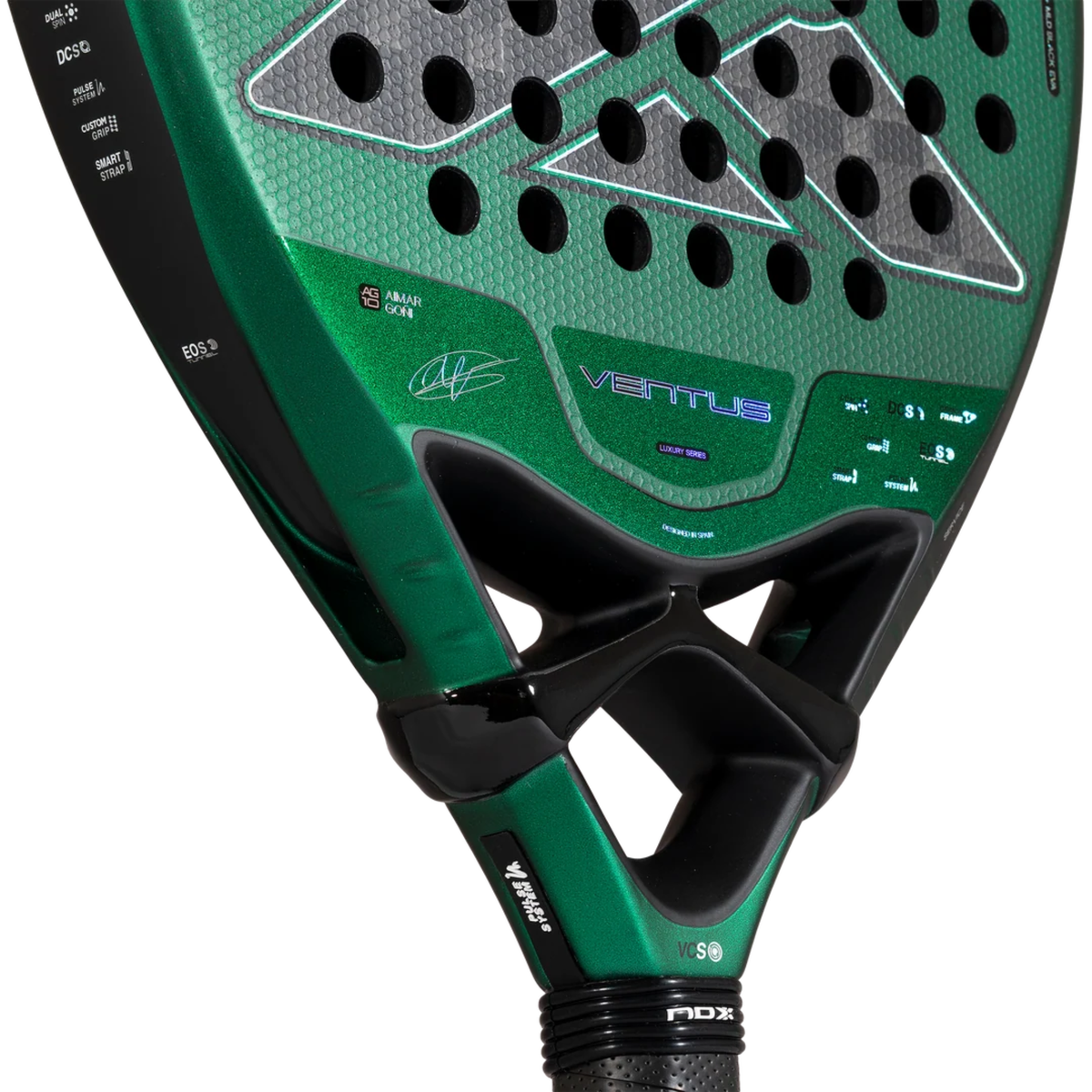 Close-up of the lower face of the NOX Ventus Attack 12K Xtrem Aimar Goñi 2027, showing the metallic green surface, perforated grey carbon-style pattern, Aimar Goñi signature and printed product details.