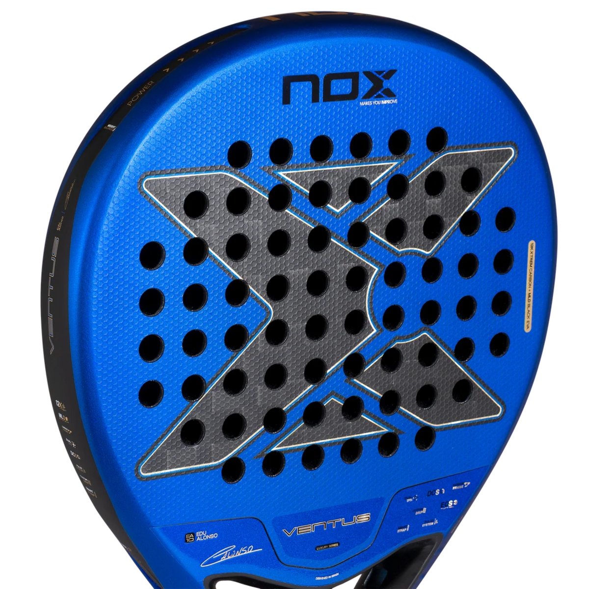 Close-up of the face of the NOX Ventus Hybrid 12K Xtrem Edu Alonso 2027 padel racket, showing the perforated surface, grey carbon-style X-shaped pattern, metallic blue finish and fine textured surface.