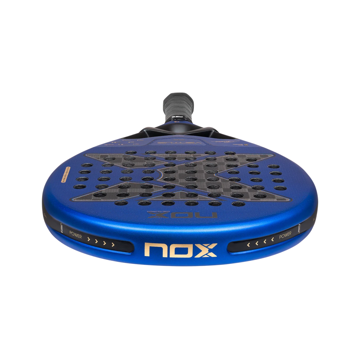 Low-angle view of the top edge of the NOX Ventus Hybrid 12K Xtrem Edu Alonso 2027 padel racket, showing the blue frame, perforated face, grey carbon-style surface and Nox branding along the edge.